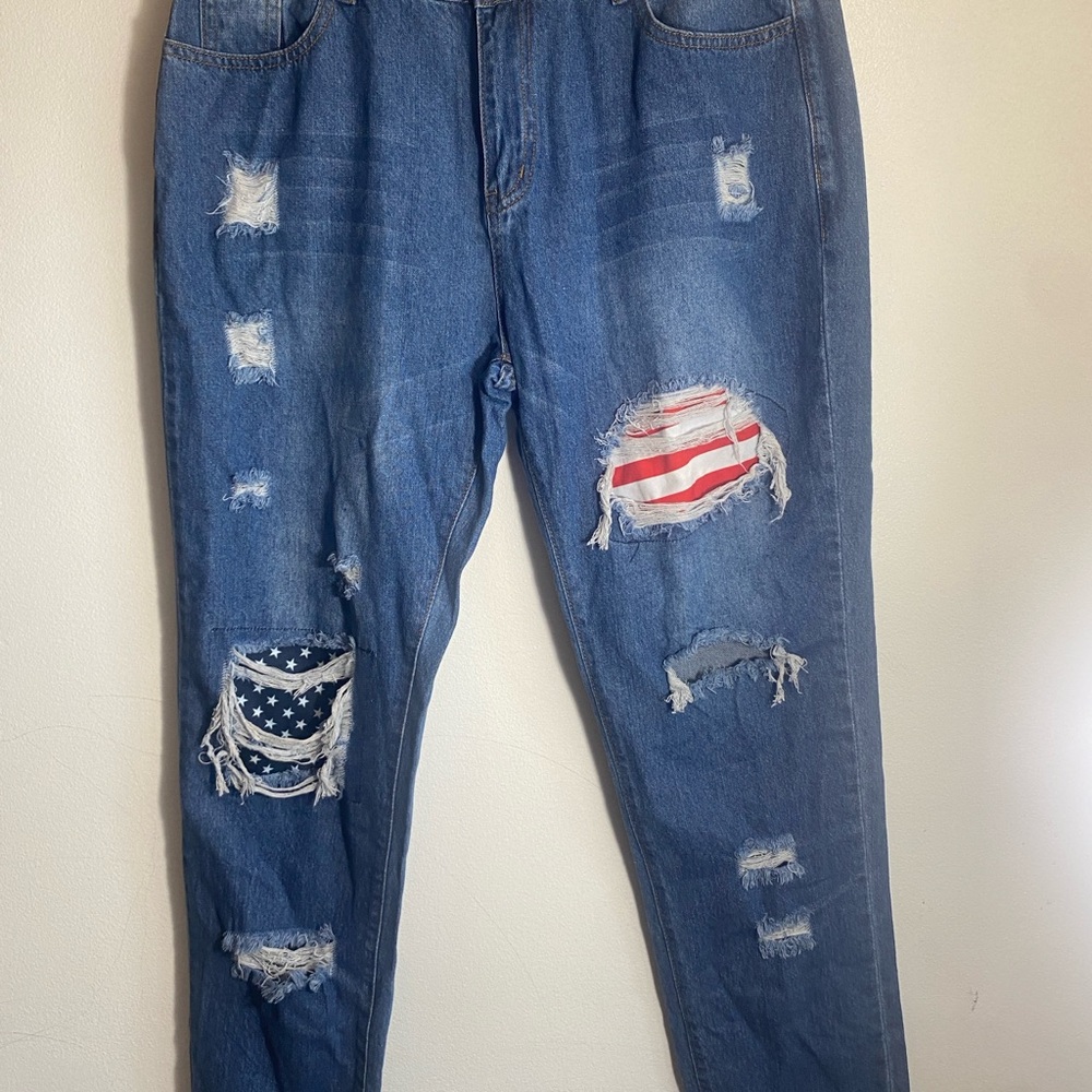 Distressed Blue Jeans with American Flag Patches